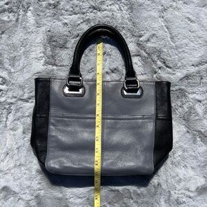 Tignanello cute smaller sized leather purse with pretty silk lining